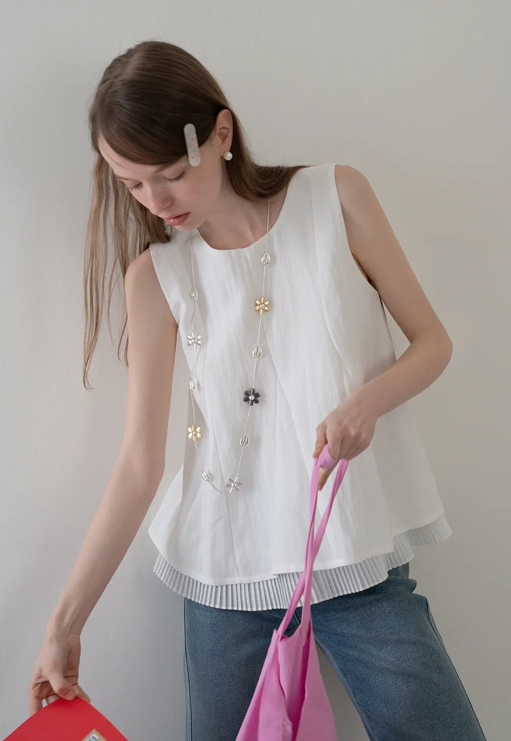 Women's Sleeveless Pleated Hem Blouse