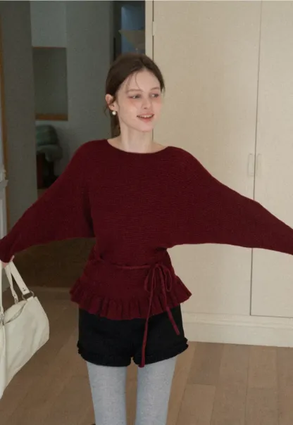 High waist shorts with ruffle hem and belt design