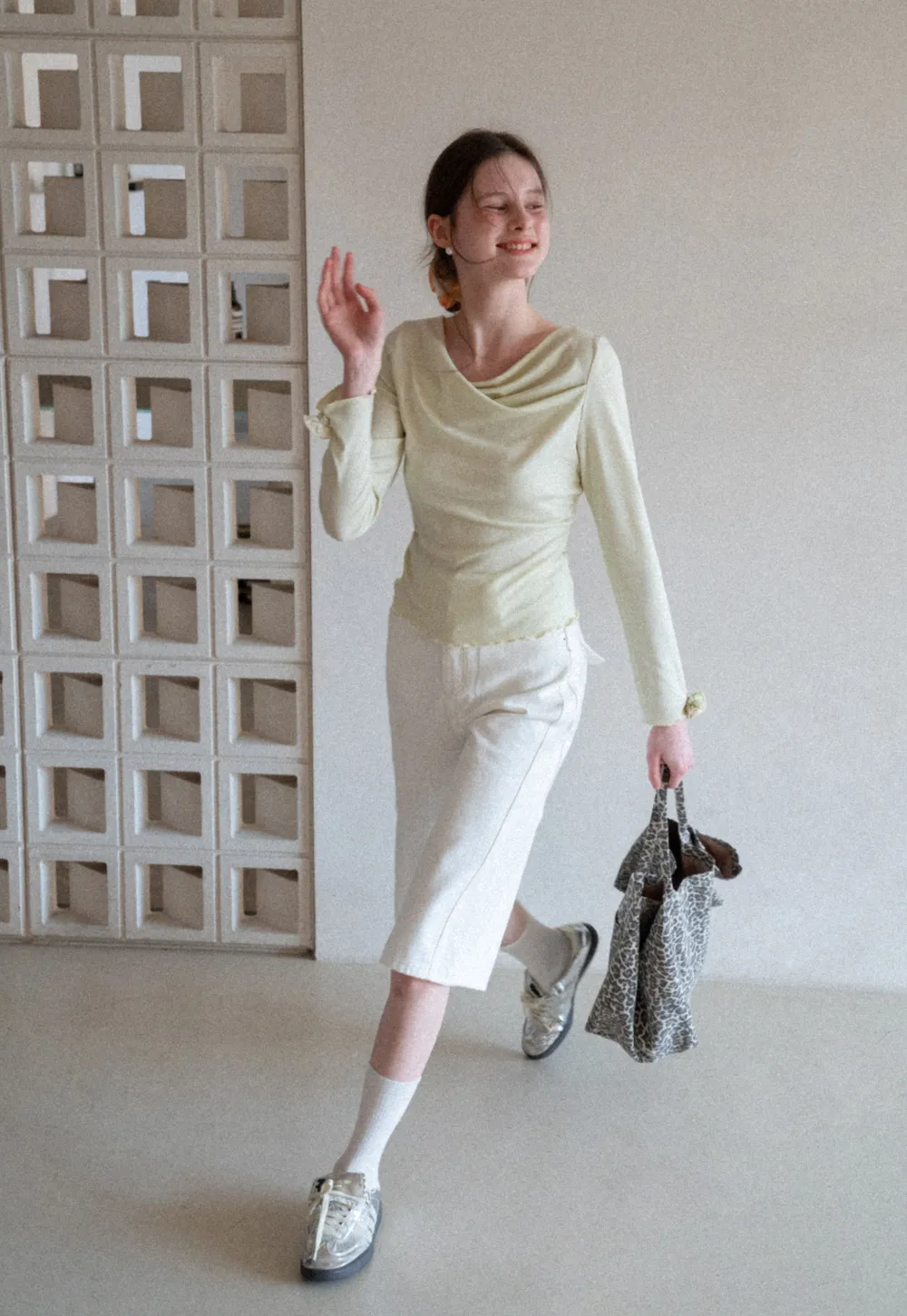 Long sleeve top with ruffled hem and cuffs