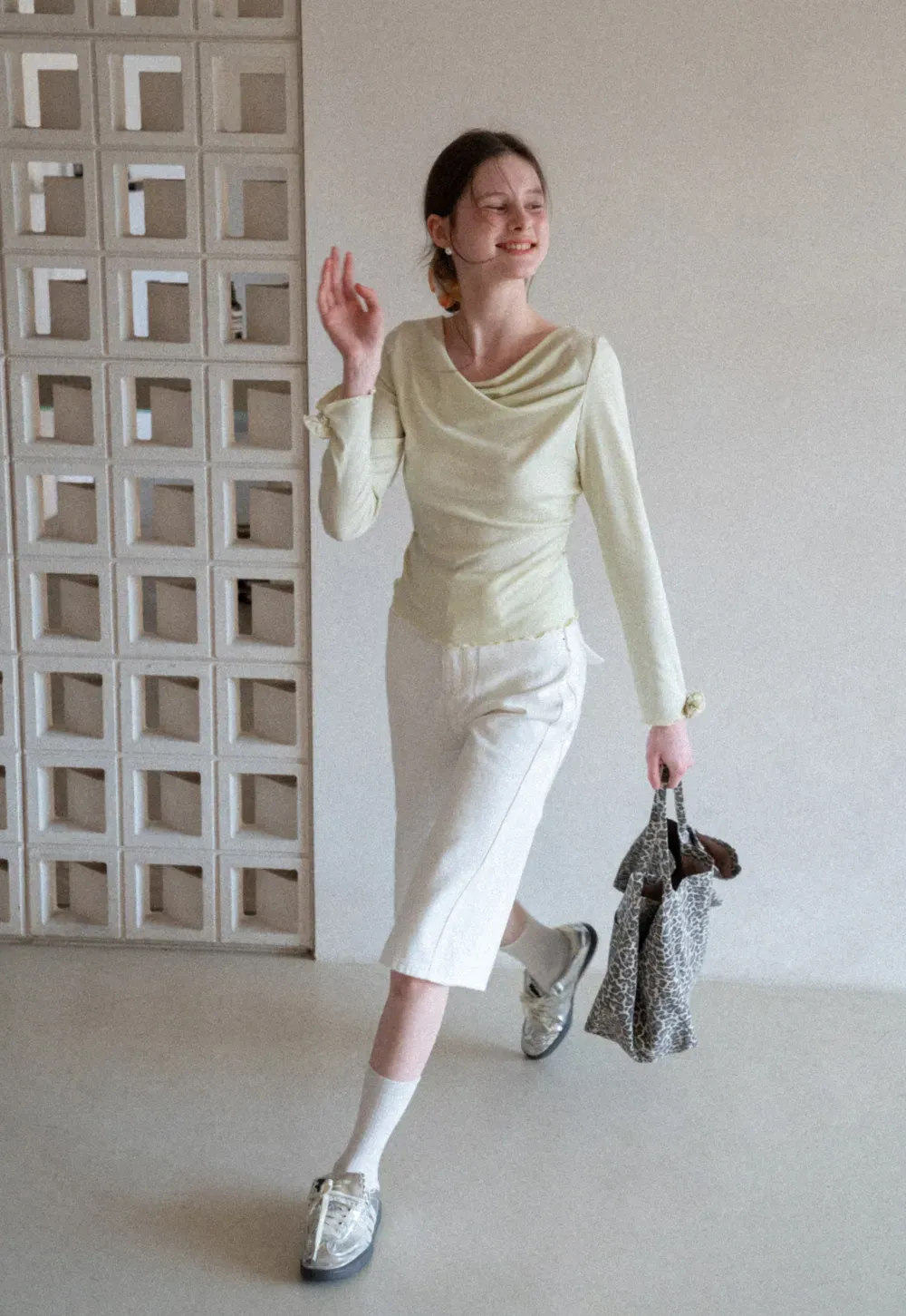 Long sleeve top with ruffled hem and cuffs