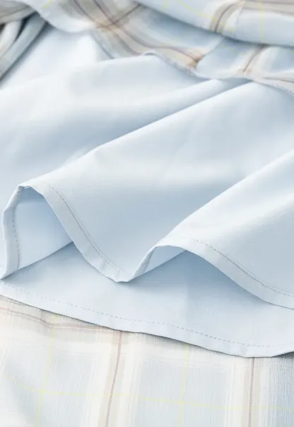 Pleated Plaid Midi Skirt with Asymmetrical Hem