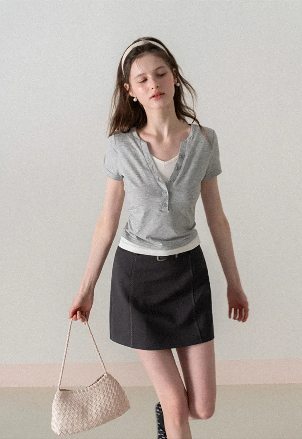 A-line mini skirt with contrast stitching and belt