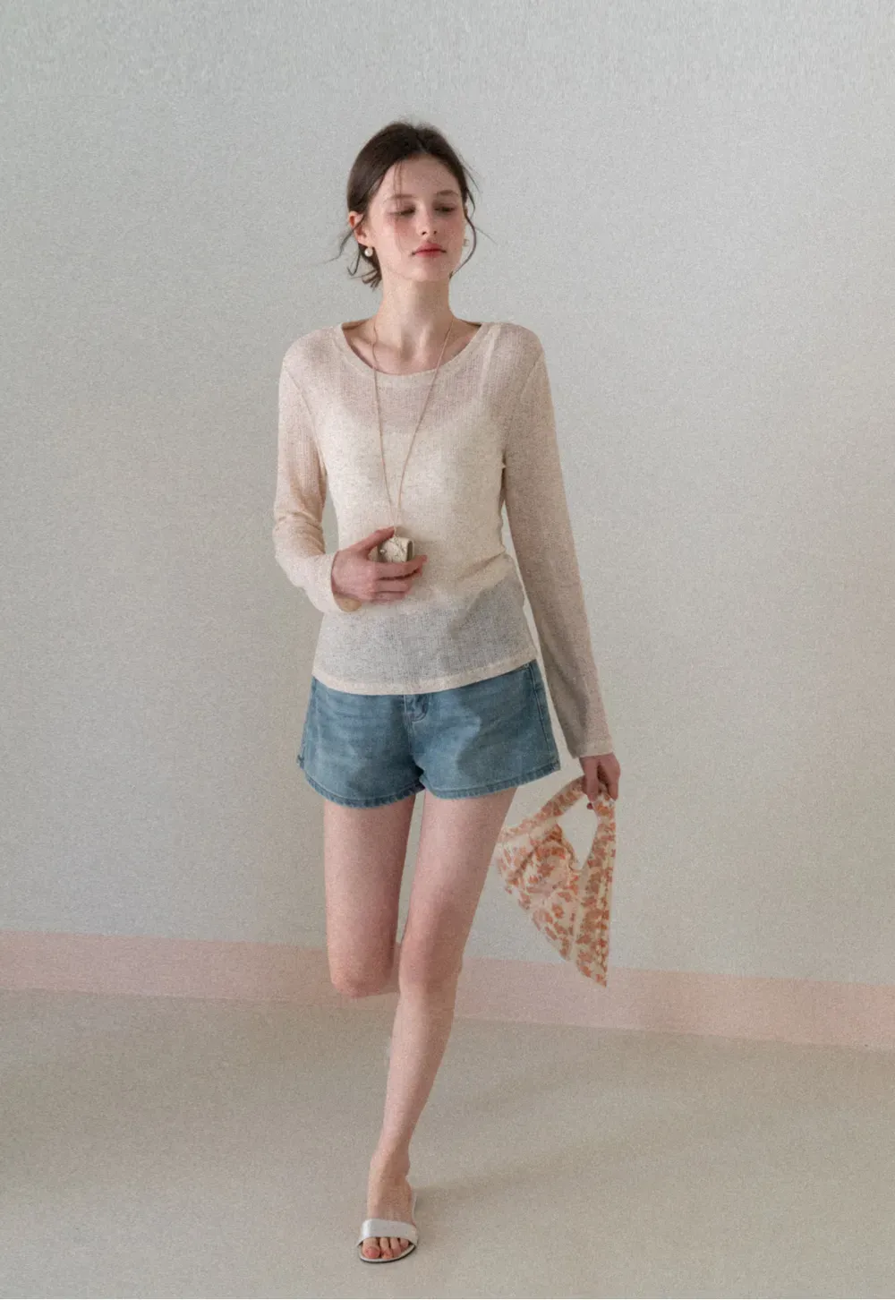 Long sleeve sheer knit top with round neckline