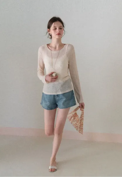 Long sleeve sheer knit top with round neckline