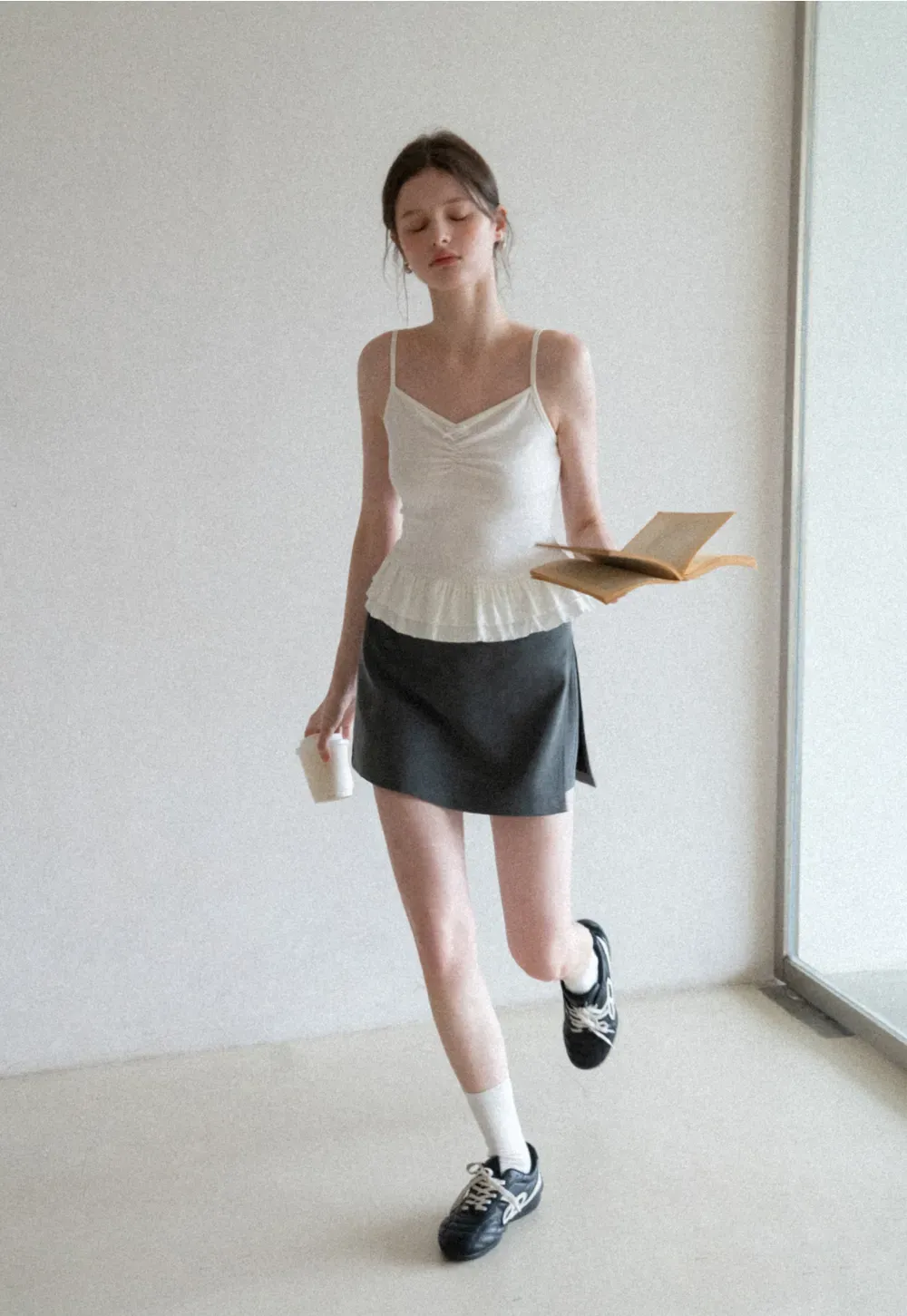 Elegant Pleated Mini Skirt with Asymmetrical Hem