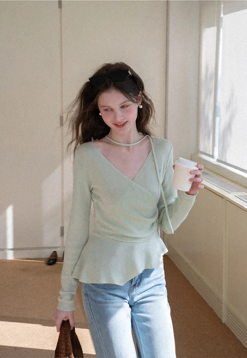 Long sleeve wrap knit sweater with ruched detail