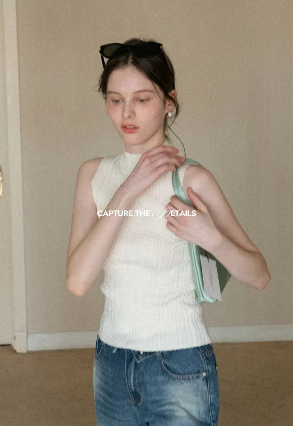 Cable Knit Sleeveless Top with High Neck Design