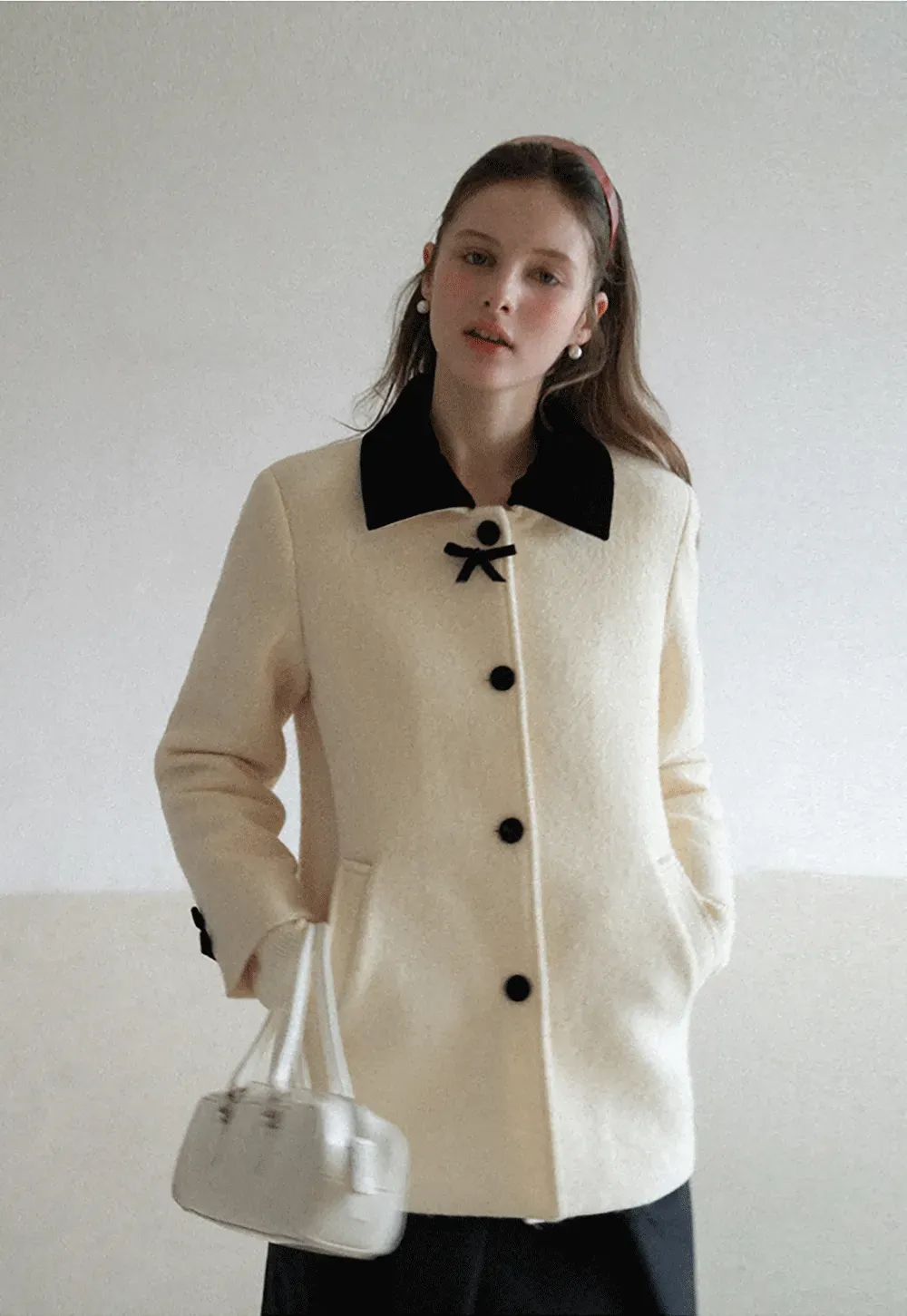 Elegant Wool Coat with Bow Detail and Contrasting Collar