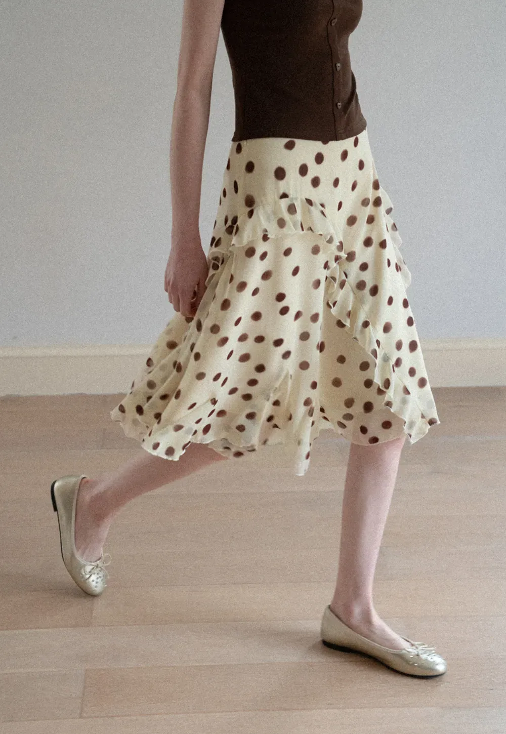 Polka dot ruffled asymmetrical midi skirt