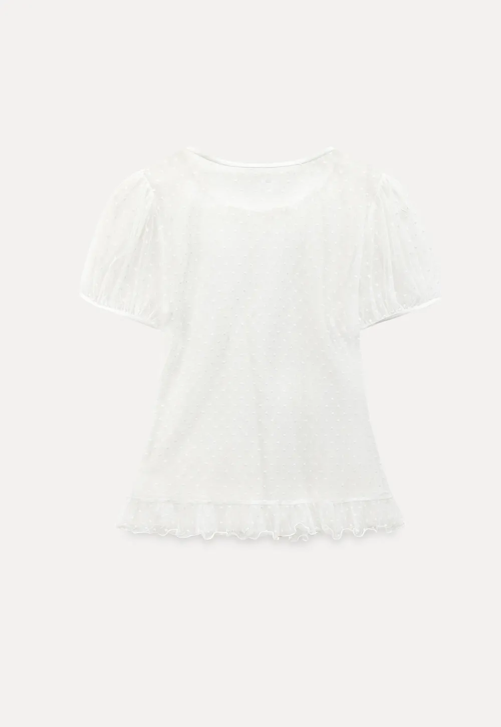 Sheer polka dot top with ruffled hem and puff sleeves