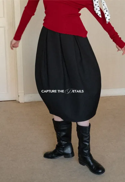 Elegant Pleated Midi Skirt with Flared Design