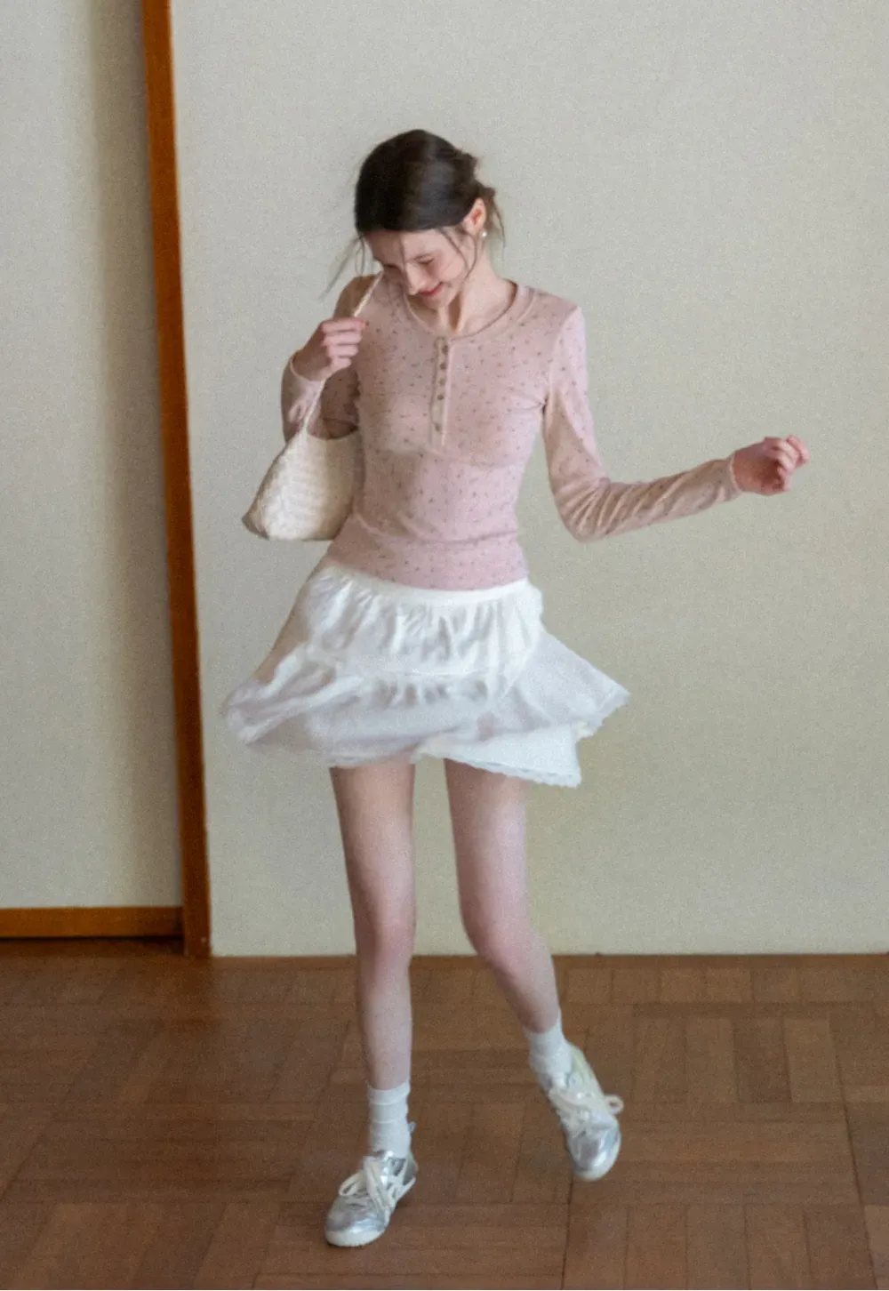 Long sleeve button front top with floral print