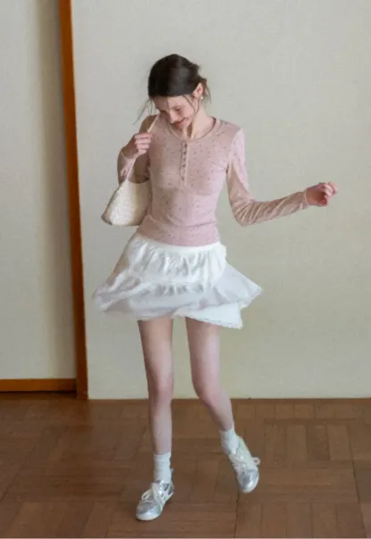 Long sleeve button front top with floral print