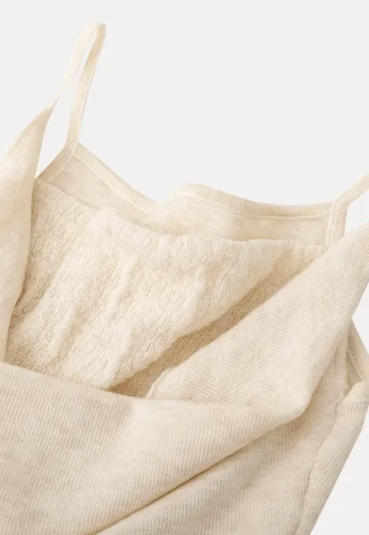 Silk-like tank top with thin straps and draped neckline