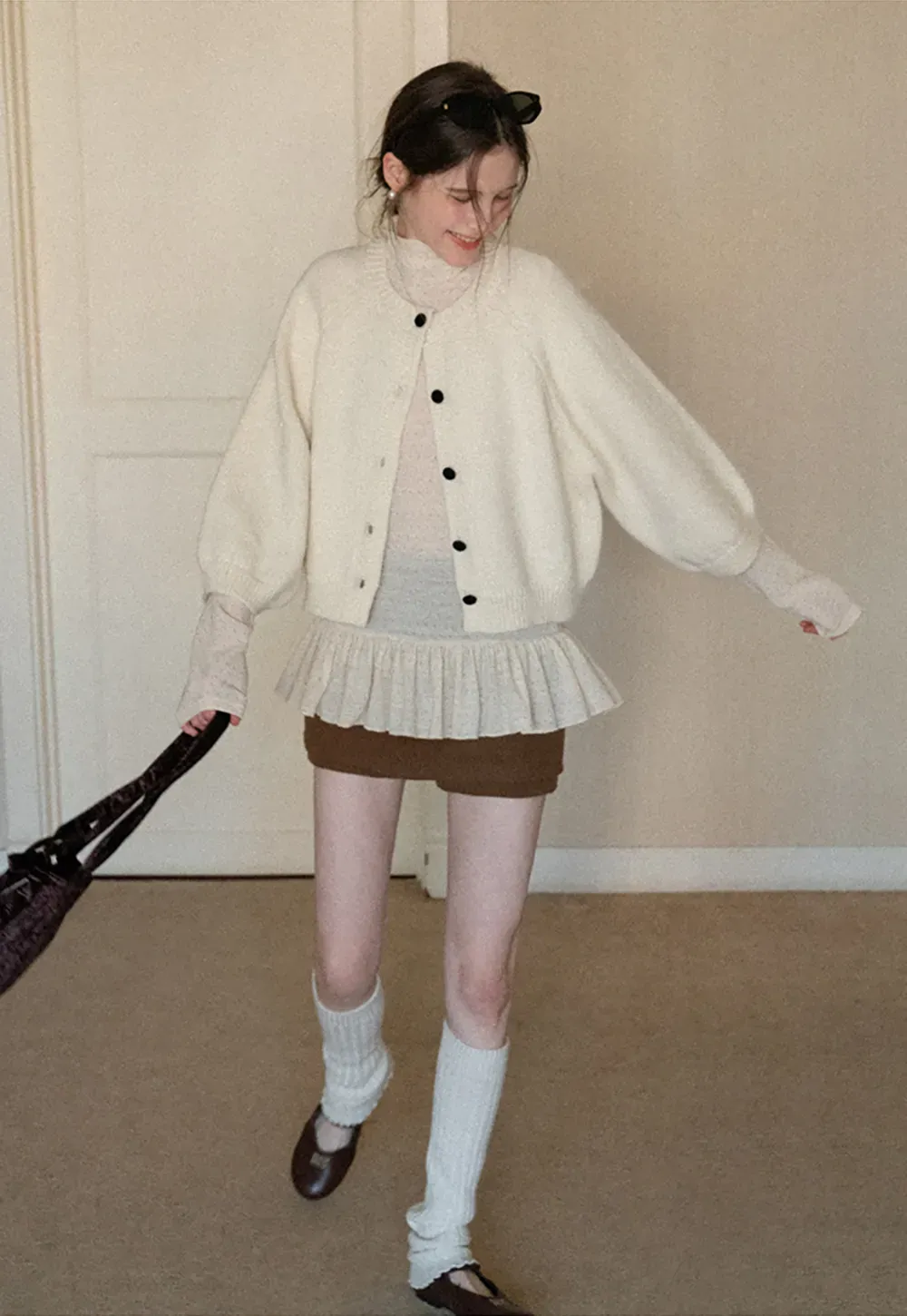 Soft knit cardigan with button front and relaxed fit