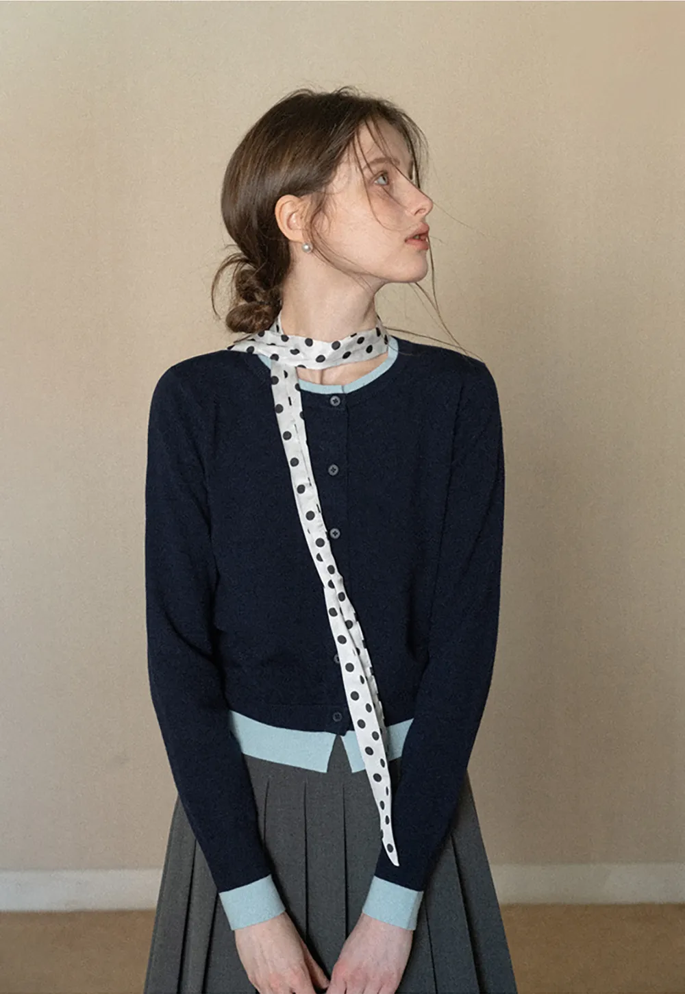 Elegant Round Neck Knit Sweater with Button Detail