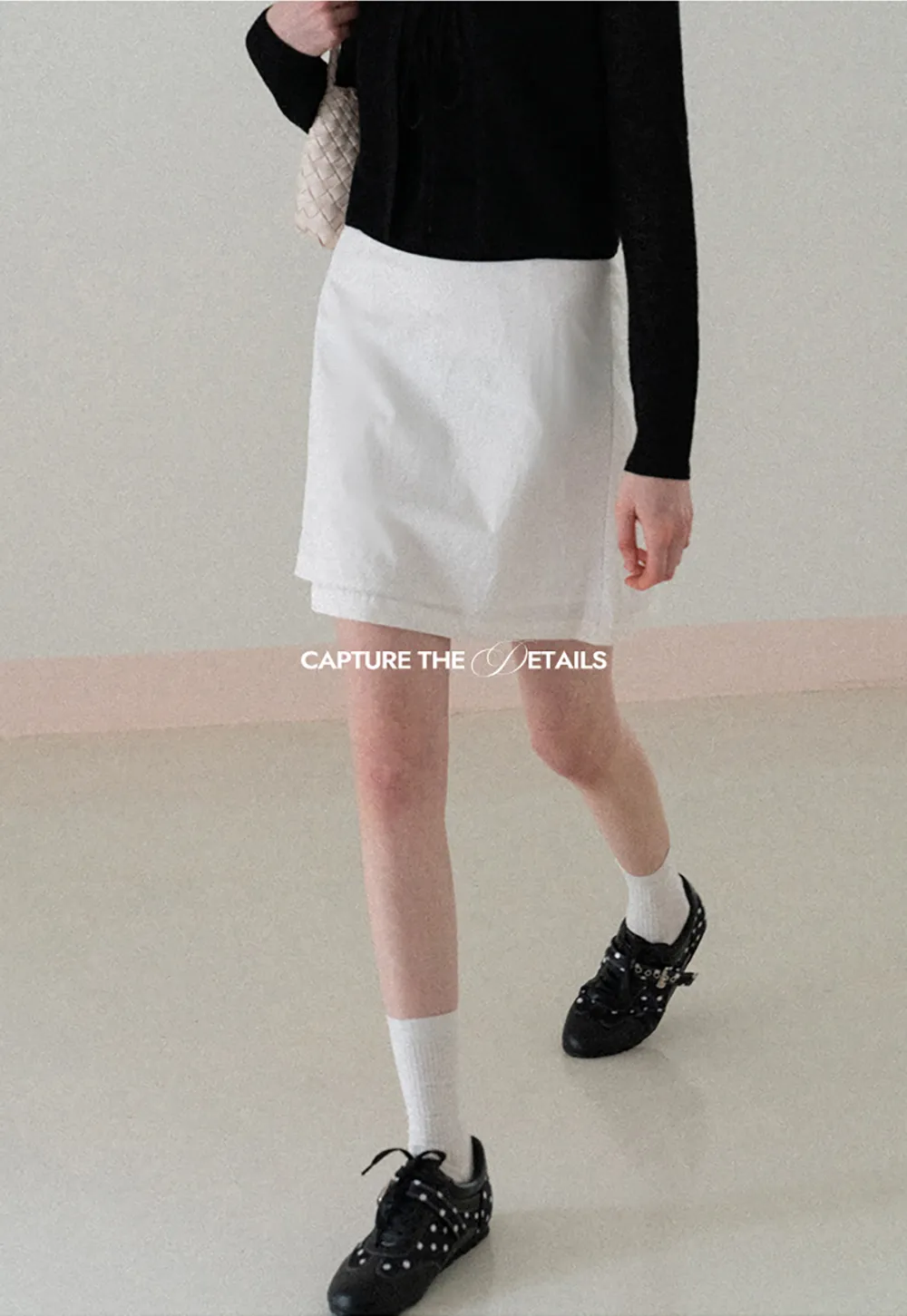 A-line mini skirt with front darts and clean hem