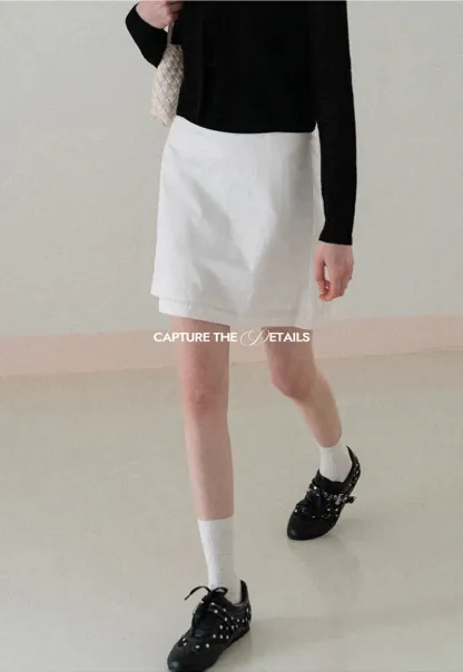 A-line mini skirt with front darts and clean hem