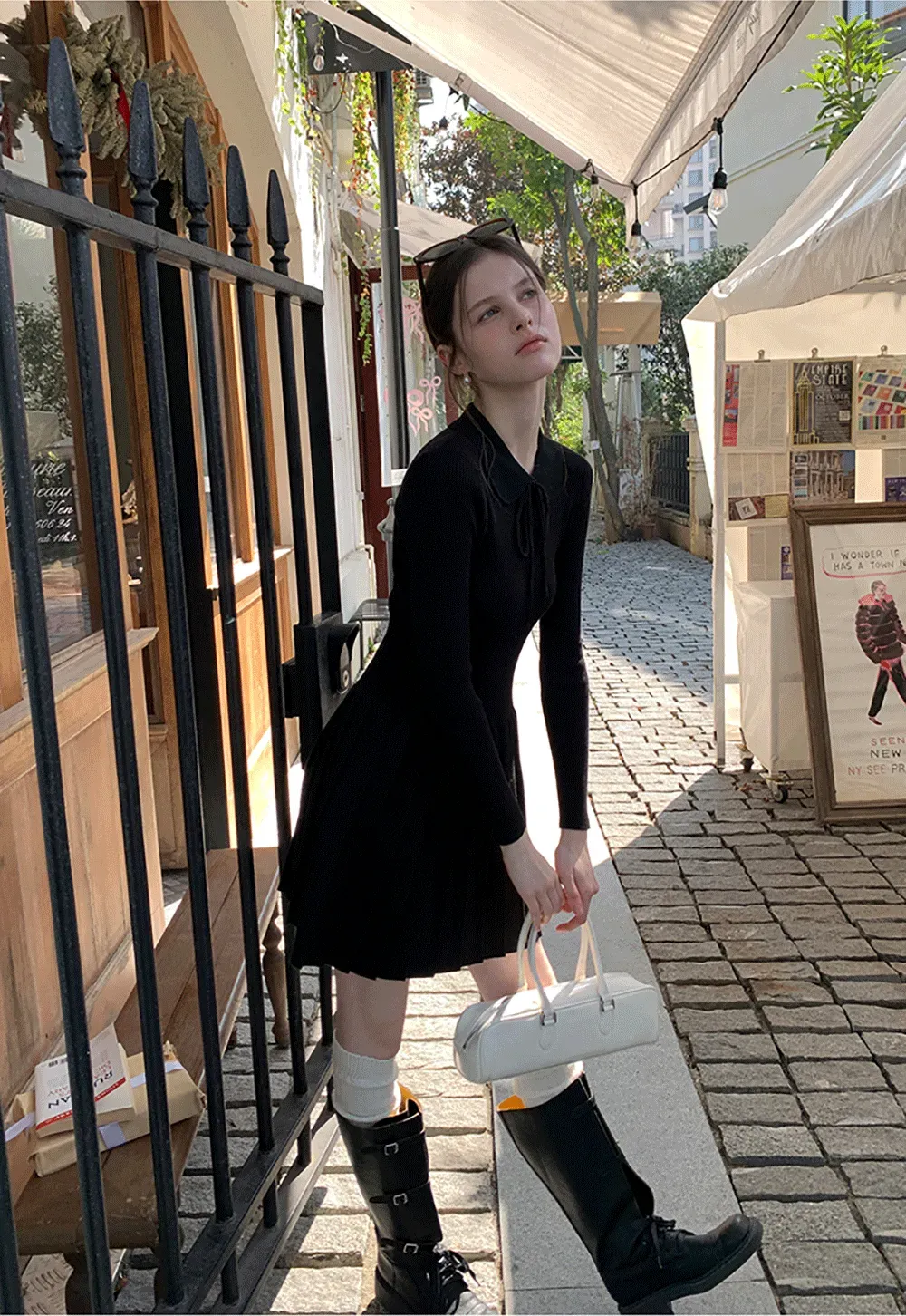 Elegant Knit Dress with Bow Detail and Flared Hem