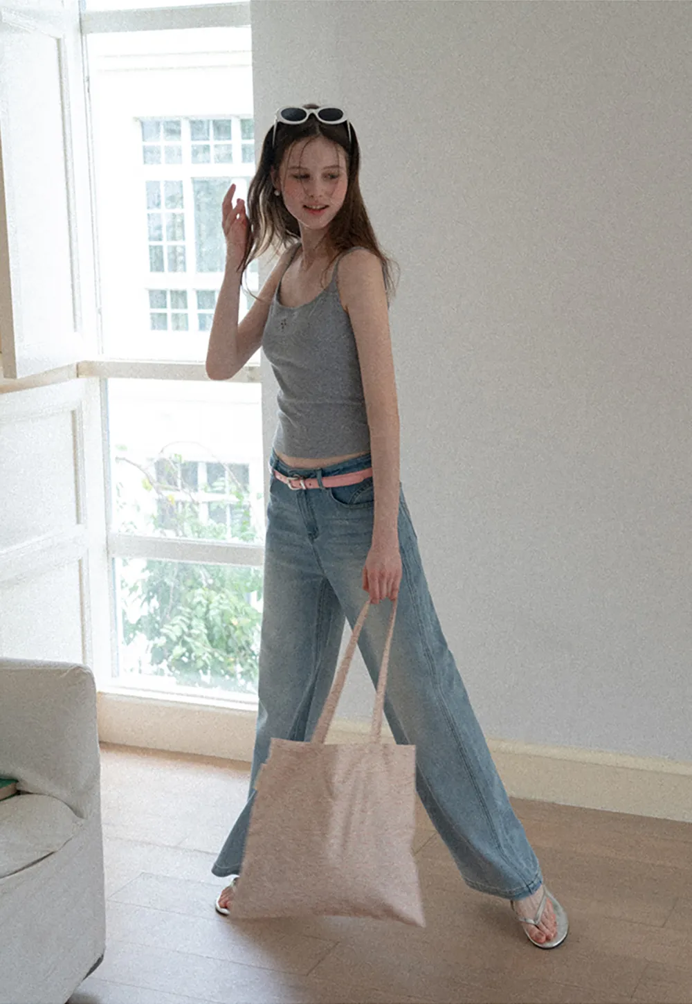 Gray tank top with small embroidered cross detail