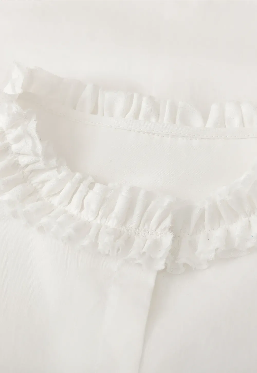 Elegant Blouse with Ruffled Collar and Cuffs