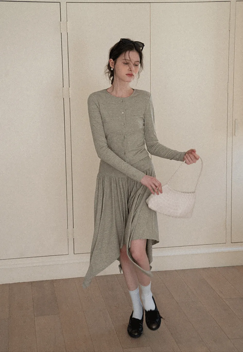 Long sleeve button front top and asymmetrical skirt