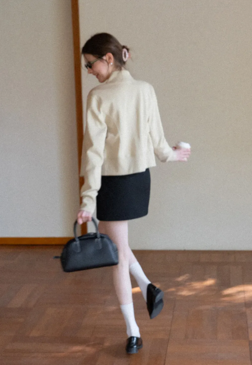 Short jacket with button front and ribbed cuffs