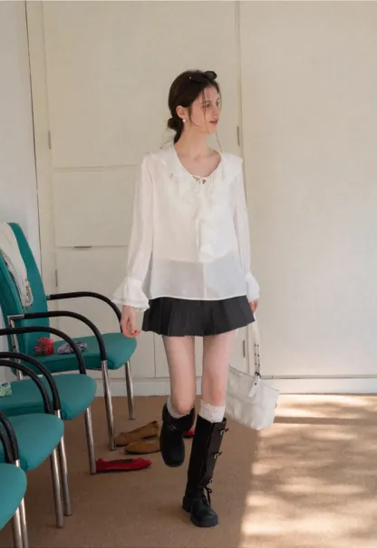 Elegant Blouse with Ruffled Neckline and Flared Sleeves