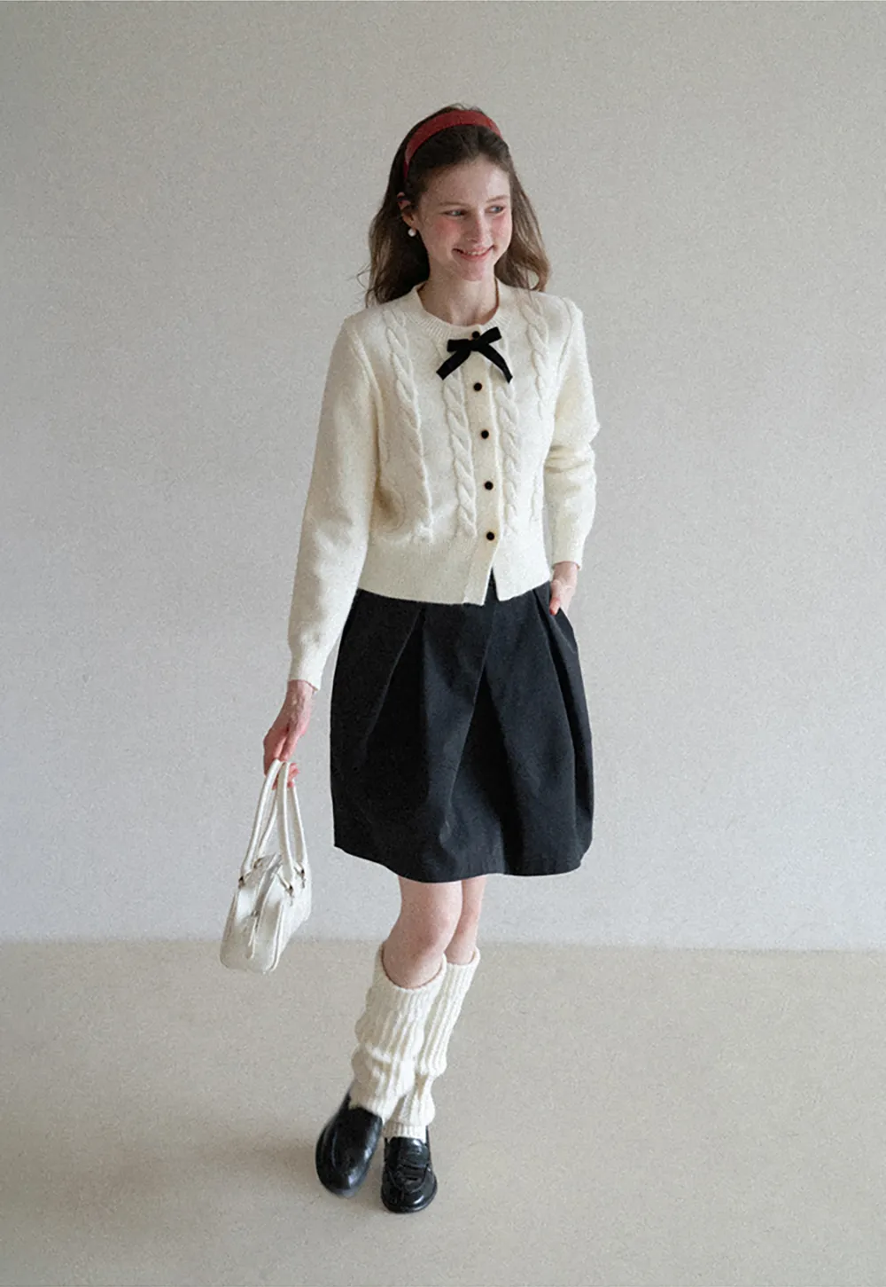 Elegant Cable Knit Cardigan with Bow Detail