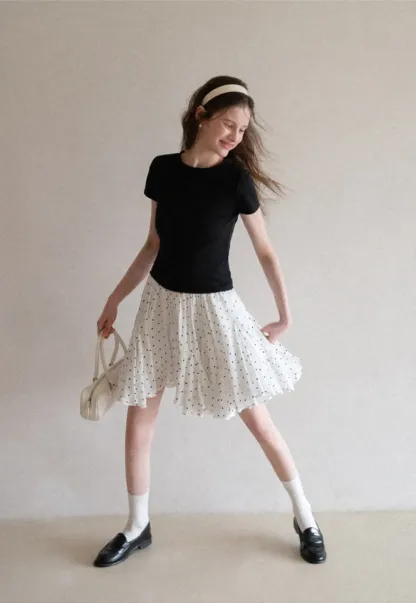 Polka dot pleated skirt with elastic waistband