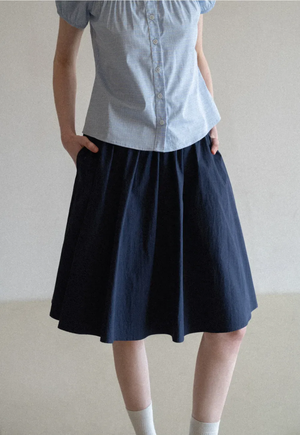 A-line pleated midi skirt with waistband