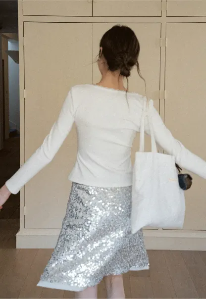 V neck long sleeve top with lace trim and fitted design