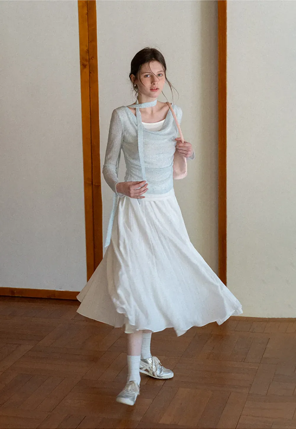 Long sleeve knit top with back tie detail