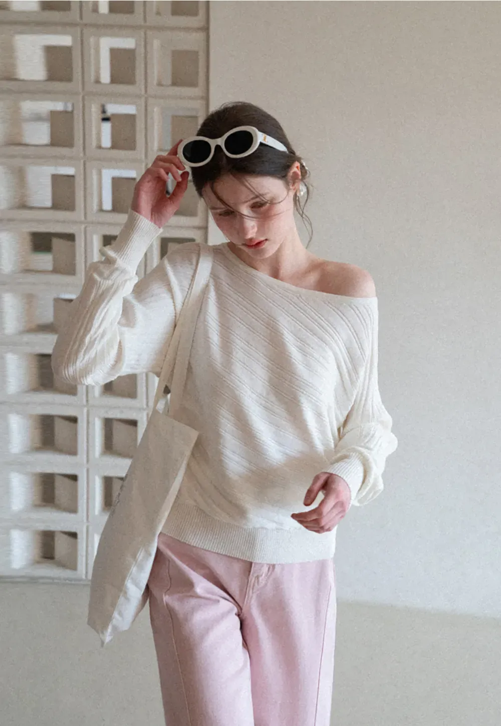 Ribbed knit sweater with wide neckline and long sleeves