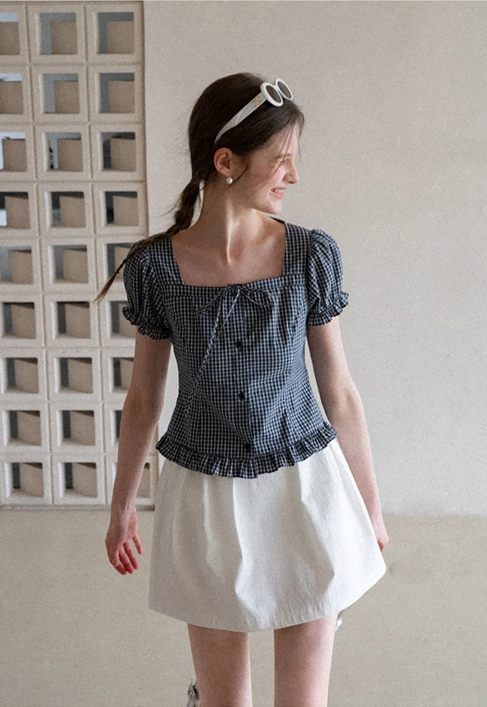 Plaid skirt with pleats and ruffled top