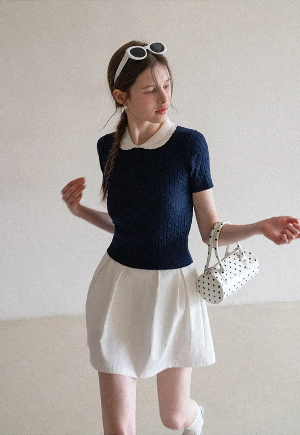 Plaid skirt with pleats and ruffled top