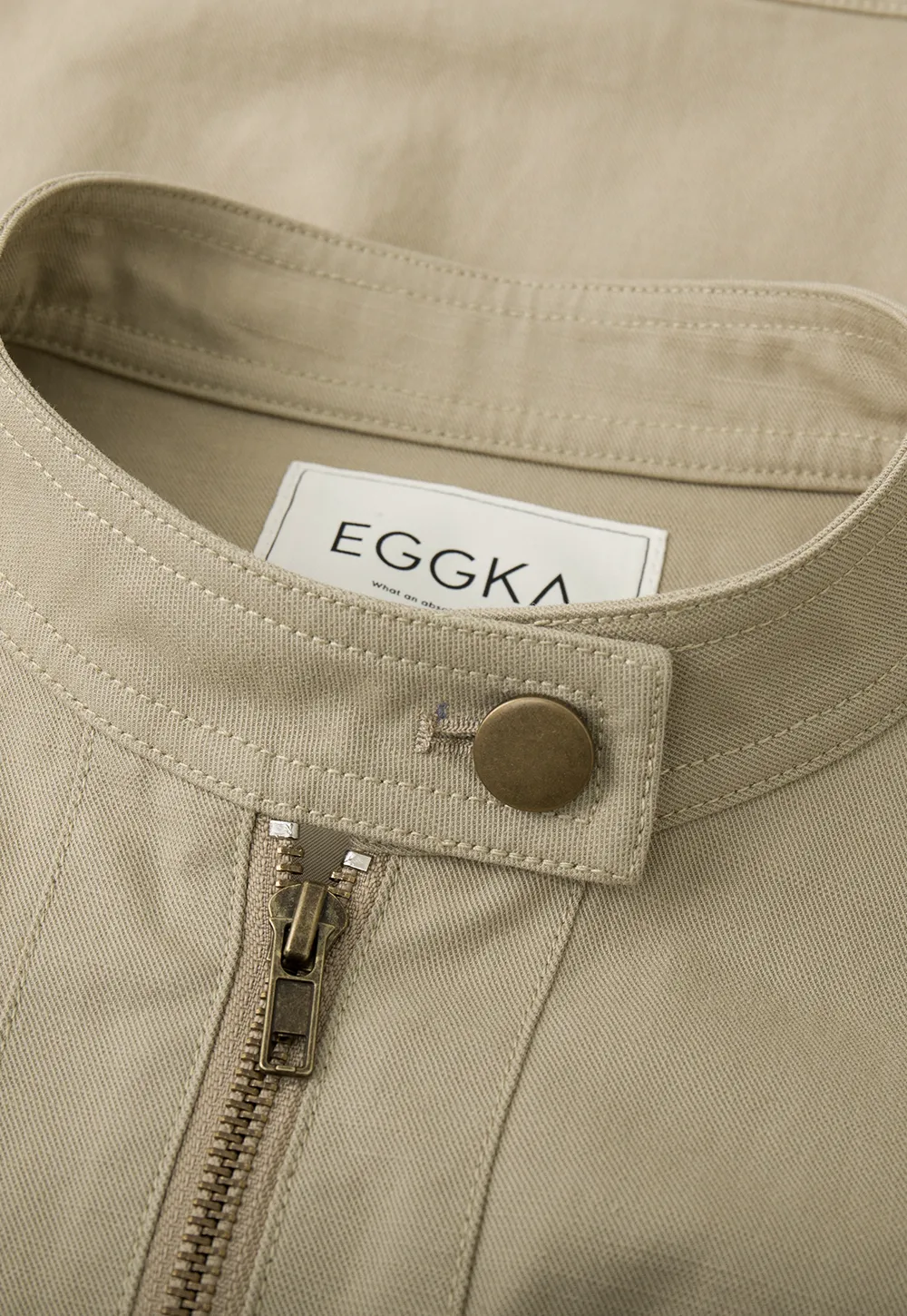 Short jacket with stand collar and front pockets