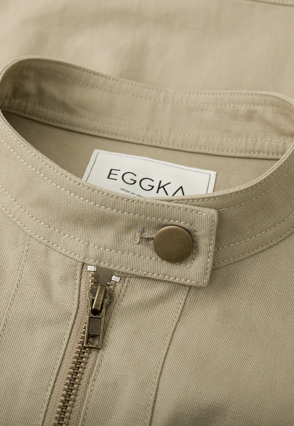 Short jacket with stand collar and front pockets