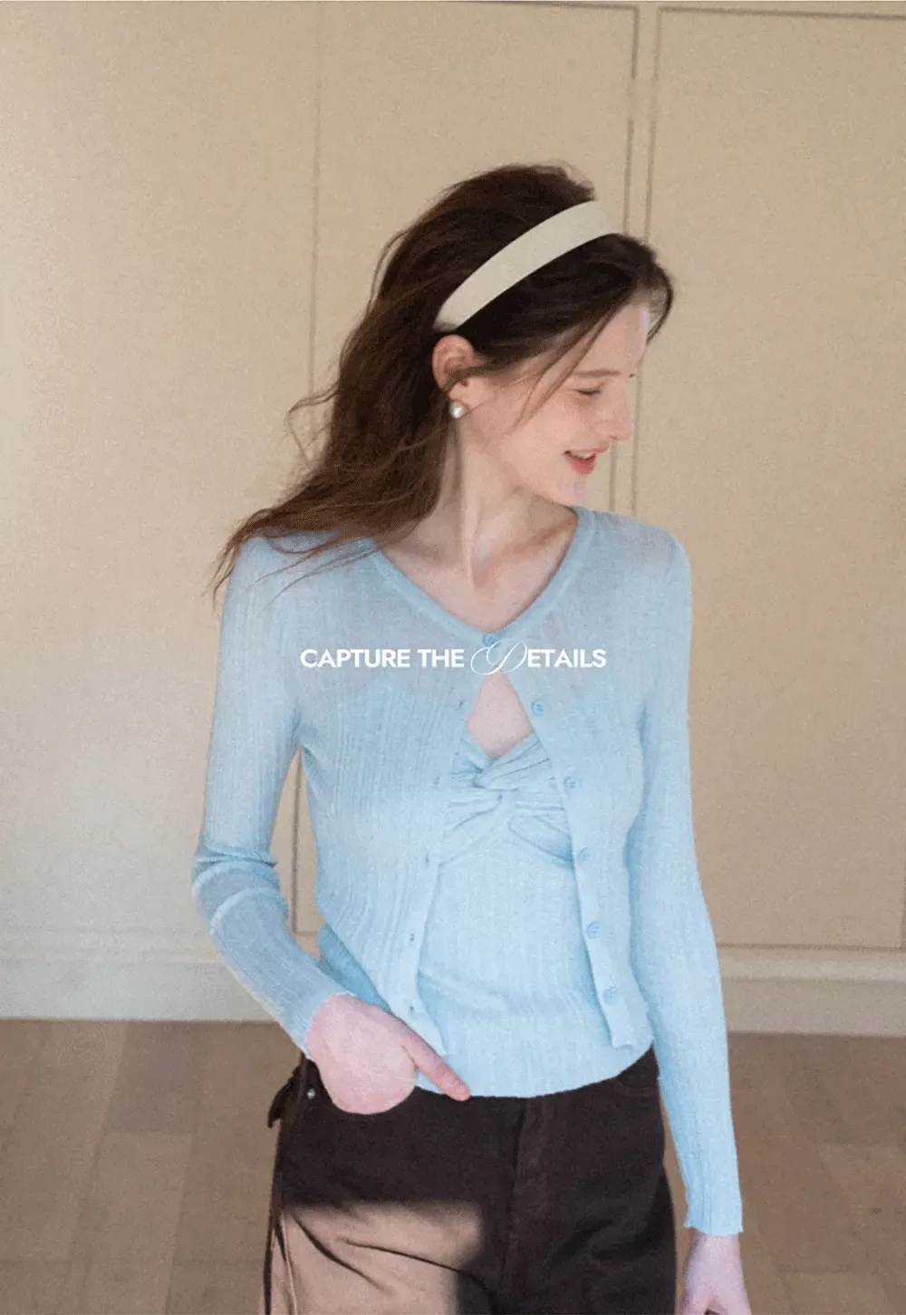 Ribbed knit sweater with V neckline and long sleeves