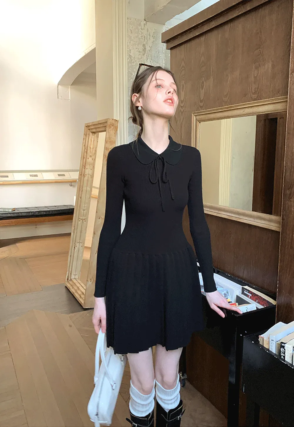 Elegant Knit Dress with Bow Detail and Flared Hem