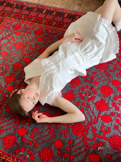 Tiered skirt with lace trim and gathered waist