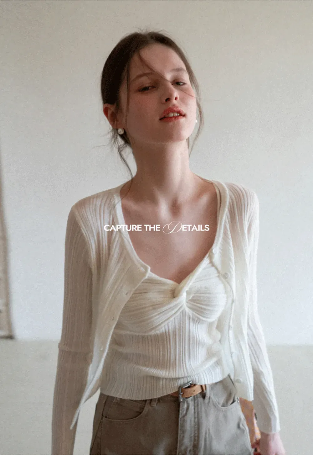 Ribbed knit sweater with V neckline and long sleeves