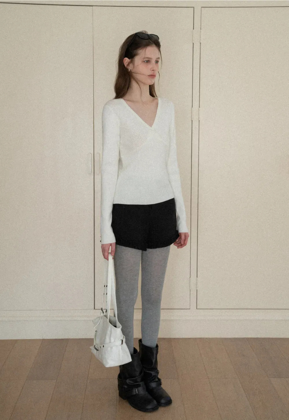 High waist shorts with ruffle hem and belt design