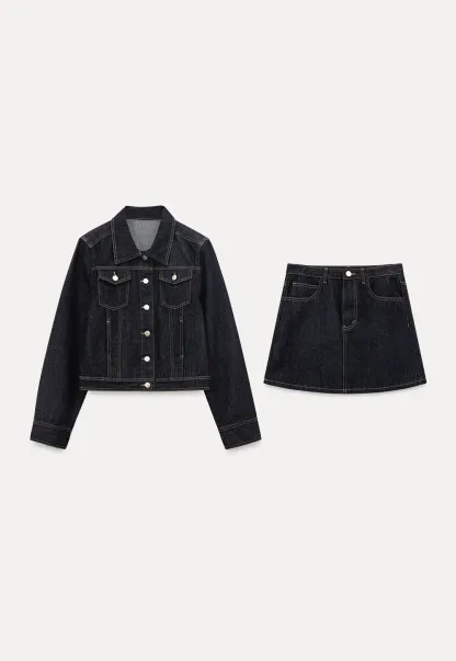 A-line denim skirt with front pocket design and adjustable waistband.