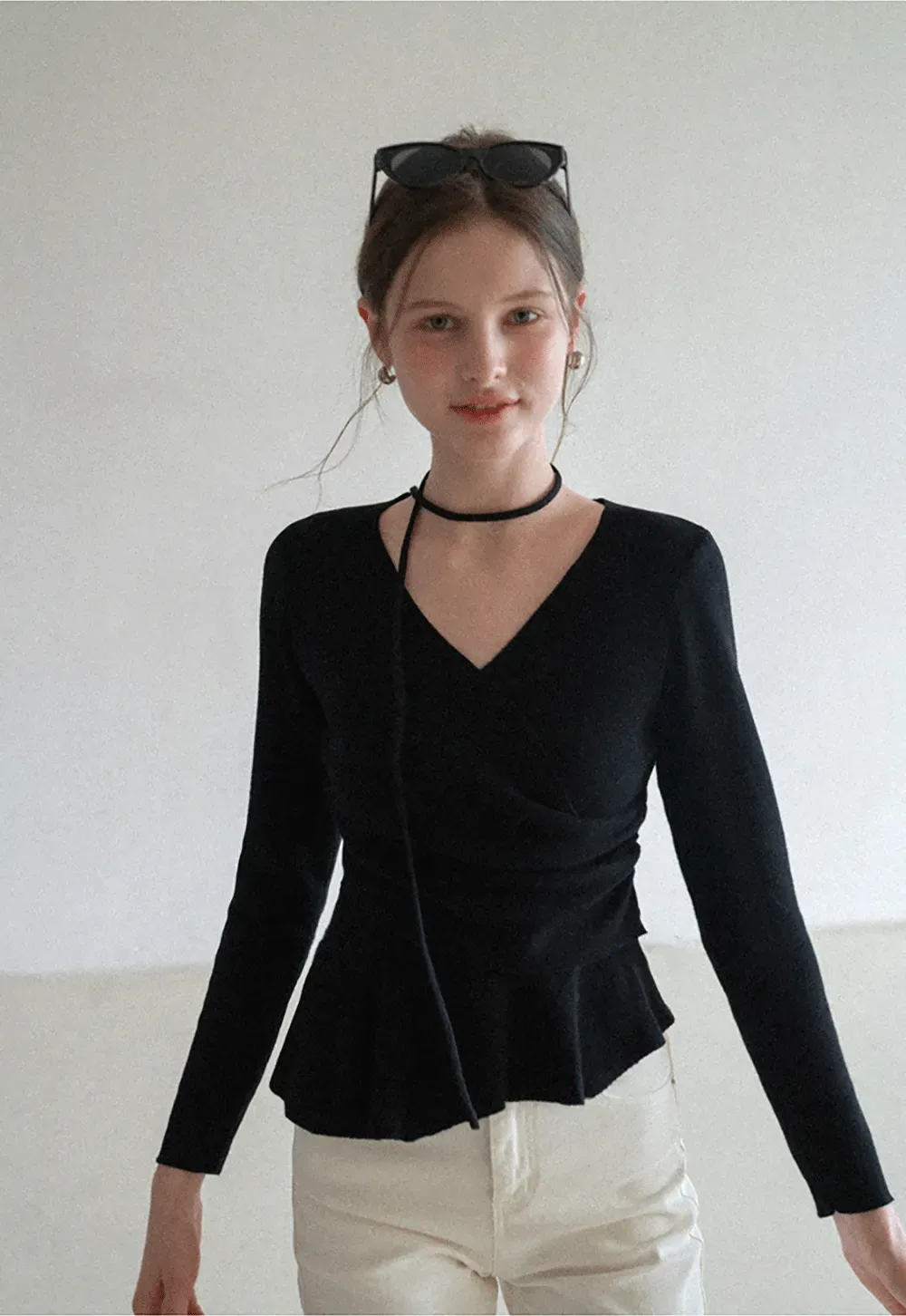 Long sleeve wrap knit sweater with ruched detail