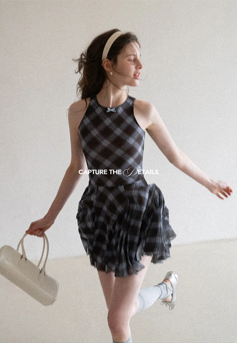 Plaid sleeveless dress with flared skirt