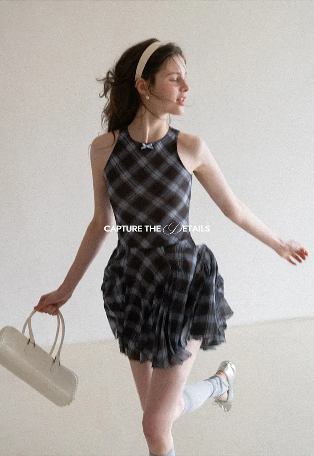 Plaid sleeveless dress with flared skirt