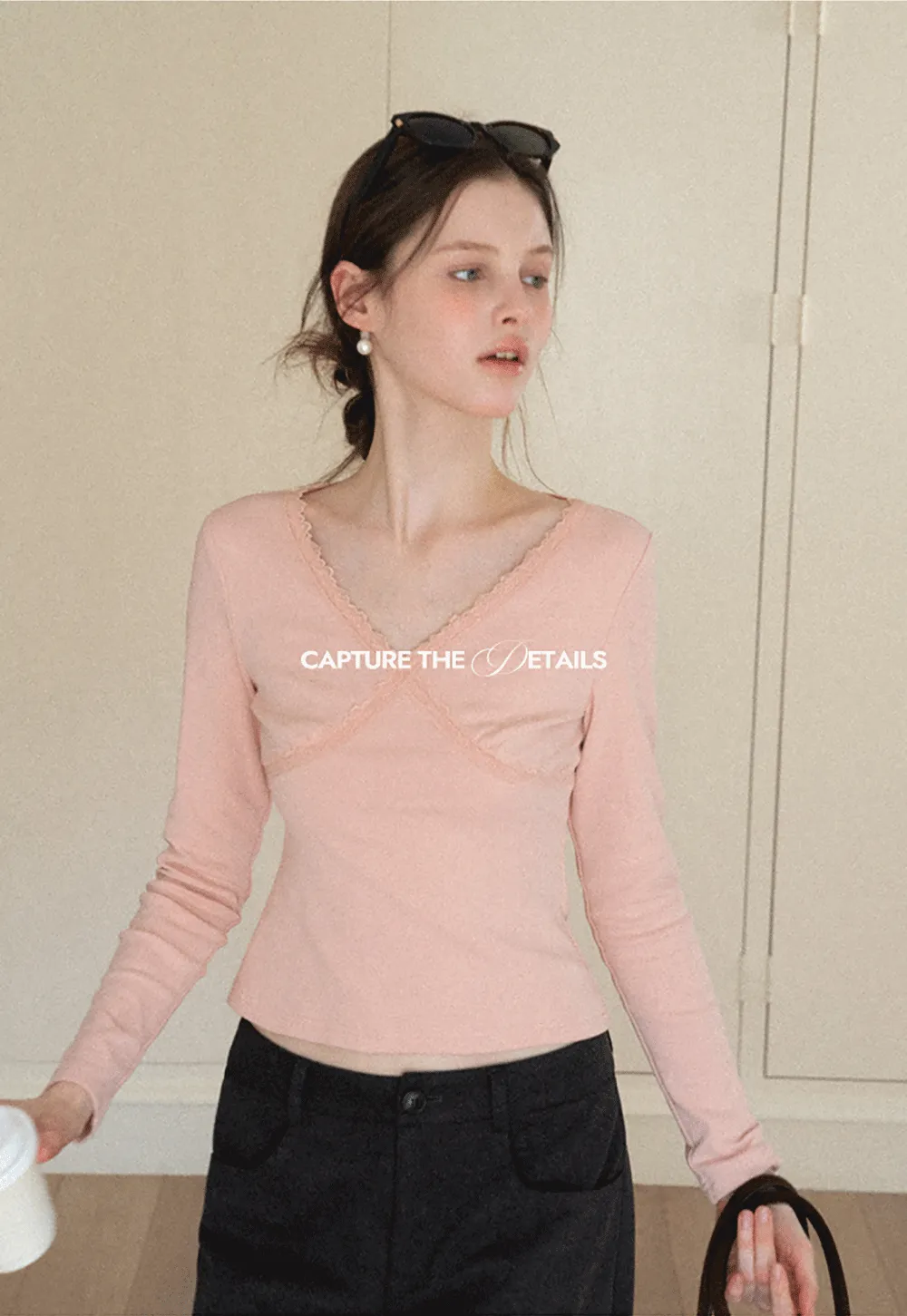 V neck long sleeve top with lace trim and fitted design