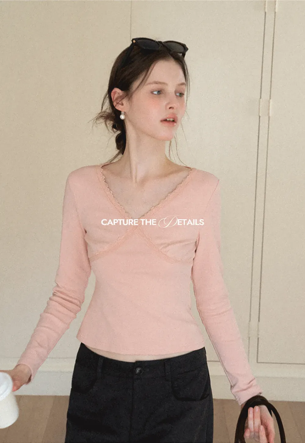 V neck long sleeve top with lace trim and fitted design