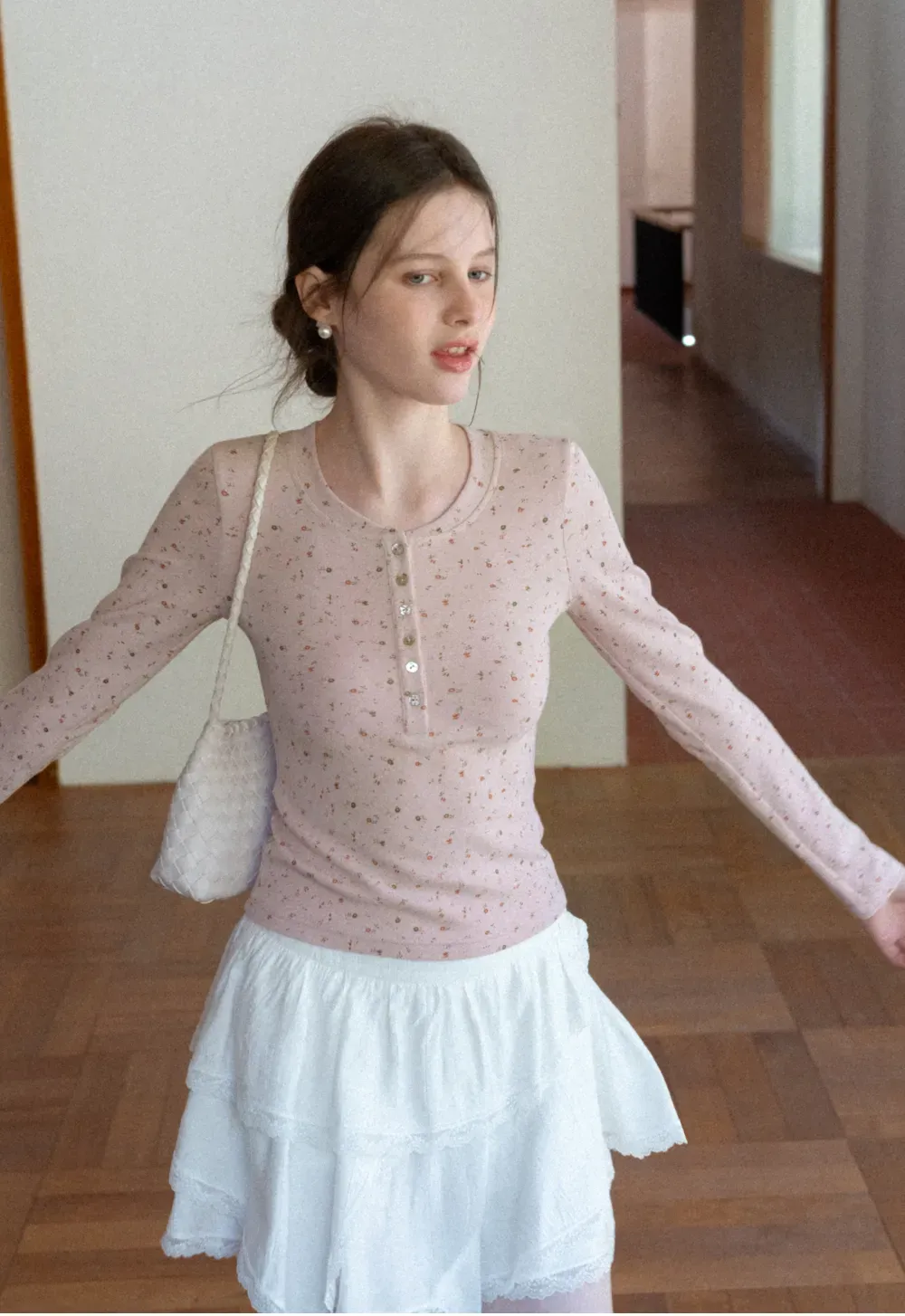 Long sleeve button front top with floral print